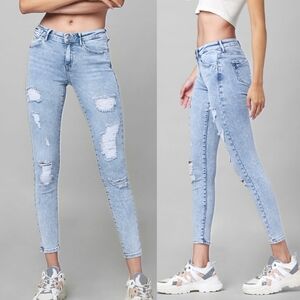 mossimo - distressed white denim low rise skinny jeans